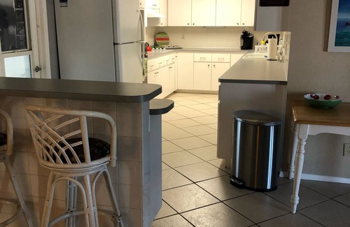 Gulf Harbors House | Pet-Friendly Canal Retreat with Heated Pool & Ocean View