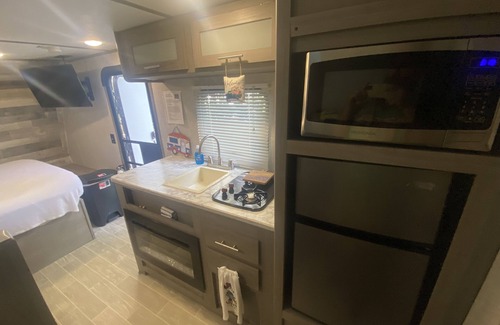 Paisley House | Family-Friendly Coleman Bunkhouse Camper Delivered to You