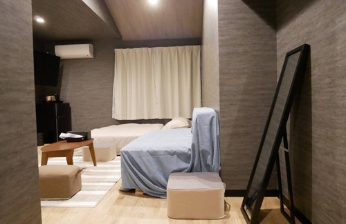 Amami Hotel | Relaxing HOOD Inn with Private Sauna & Family-Friendly Amenities