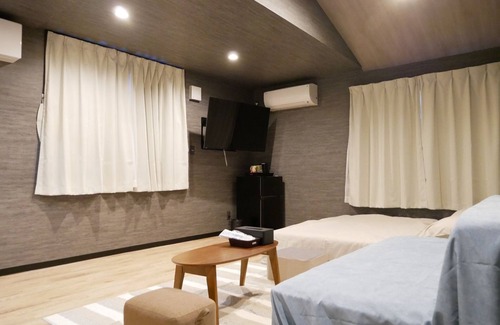 Amami Hotel | Relaxing HOOD Inn with Private Sauna & Family-Friendly Amenities