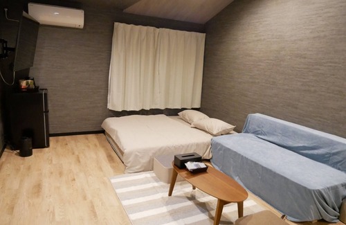 Amami Hotel | Relaxing HOOD Inn with Private Sauna & Family-Friendly Amenities