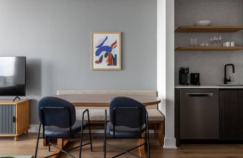 Rainey Street Historic District Apartment | Elevated Condo with Pool on Rainey Street by Locale