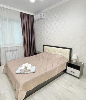 Atyrau Apartment | Inviting Sunlit Apartment with Breakfast & Family-Friendly Perks