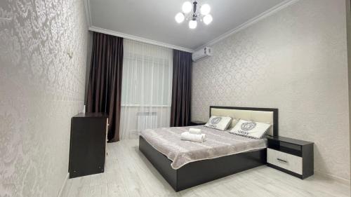 Atyrau Apartment | Inviting Sunlit Apartment with Breakfast & Family-Friendly Perks