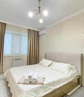 Atyrau Apartment | Inviting Sunlit Apartment with Breakfast & Family-Friendly Perks