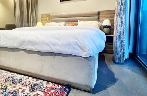 Noida Apartment | Discover 21st Karma Studios Delhi: Pet & Child Friendly Stay