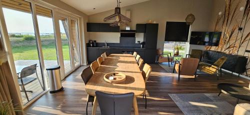 Hindeloopen Resort | 238 Stunning IJsselmeer View - 365 Days Watersport & Kite Fun