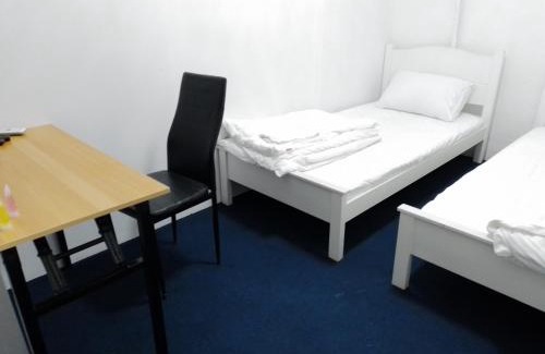 Downtown George Town Hostel | Family-Friendly Retreat at 246housecafe with Dining Options