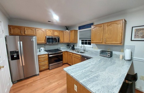 Stafford House | Inviting 5BR Townhouse with Breakfast & Family Amenities