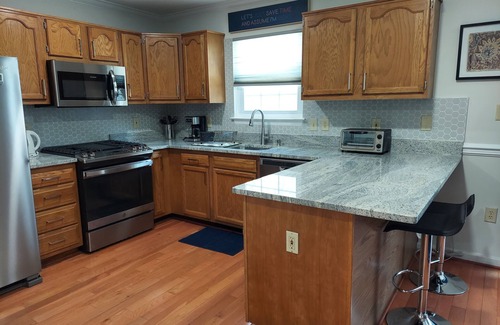 Stafford House | Inviting 5BR Townhouse with Breakfast & Family Amenities