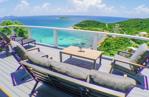 Estate Enighed Villa | Ultimate Sunrise Retreat: Oceanfront Spa & Hot Tub Escape