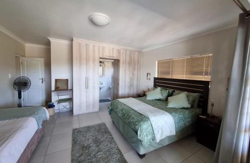 Hartenbos Apartment | Oceanfront Bliss at 25 On Rooiels - Rated 9/10 by Guests