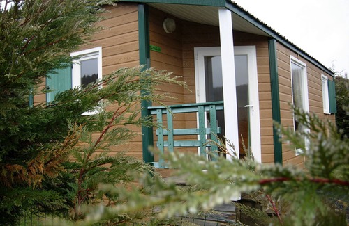 Saint-Jacques-d'Ambur Ski Chalet | Discover VULCANIA Clermont: Beachfront Retreat with Pool