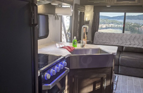 Hot Springs House | Exceptional 29ft Alpha Wolf RV & Sibley Tent Combo with Hot Tub