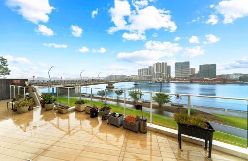 Rhodes Apartment | Serene 2B APT with Waterfront Views & Family-Friendly Amenities
