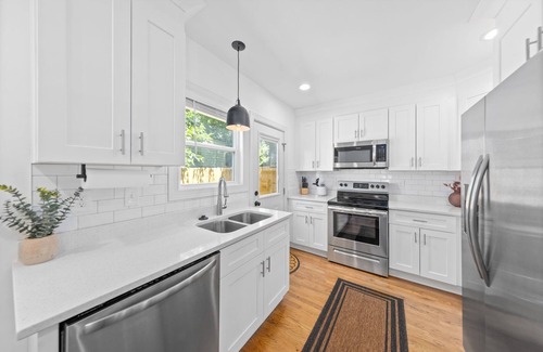 Charlotte House | Top-Rated Queen Bee Suite with Inviting Patio & Breakfast