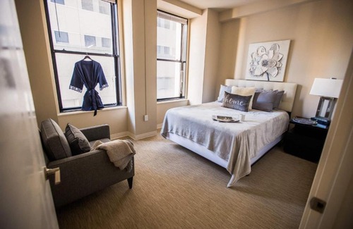 Downtown Baltimore Apartment | Executive 2BR/2BA Suite with Gym & Family-Friendly Amenities