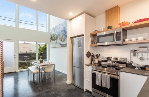 West Woodland House | Stylish 2BR with Rooftop View & Pet-Friendly Amenities