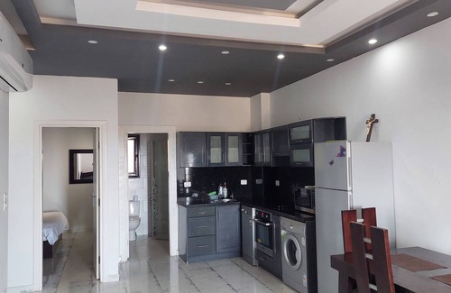 Al Ahyaa Ski Chalet | 2BR Apartment Side Sea View Pool Turtles Beach