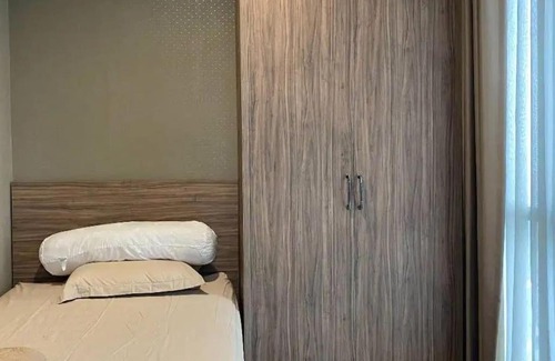 Jakarta Apartment | Inviting 2BR Taman Anggrek Residences with Pool & Spa
