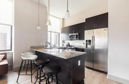 Downtown Baltimore Apartment | Stylish 2BR Apartment with Rooftop Deck & Pool Access