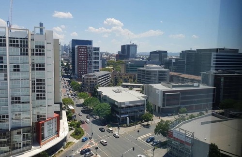 Newstead Apartment | Inviting 2BR Oasis with Pool, Rooftop & Gym Awaits You