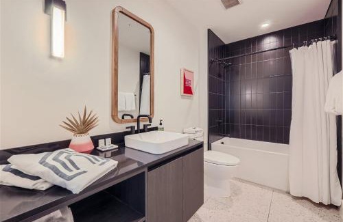 Rainey Street Historic District Apartment | Elegant 2BR Retreat with Rooftop Pool and Scenic Views