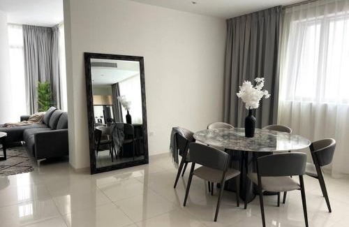 Trade Center Apartment | Inviting 2BR + Maid Suite with Gorgeous Views & Pool