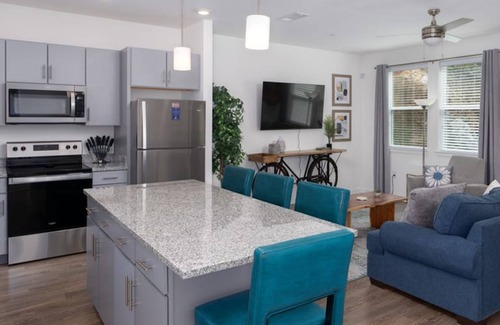 Pelham Apartment | Pet-Friendly 2BR Townhouse with Pool and Garage Access