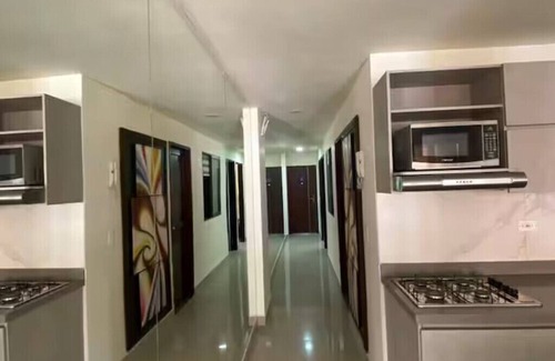 Bello Apartment | [2BR] WIFI UHS + Gourmet Kitchen+ Workspace + HotShower (BEST LOCATION)