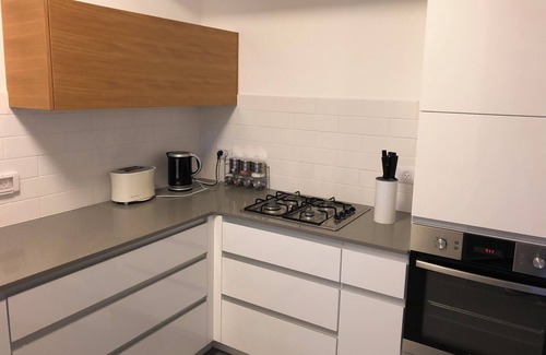 Tel Aviv Apartment | Modern 2BR with Balcony & Kitchen in New Building