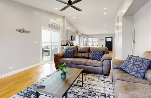 Channel Lake Apartment | Scenic Lakefront Retreat with Kayaks and Firepit Access