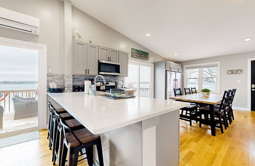 Channel Lake Apartment | Scenic Lakefront Retreat with Kayaks and Firepit Access