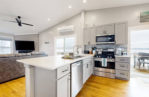 Channel Lake Apartment | Scenic Lakefront Retreat with Kayaks and Firepit Access