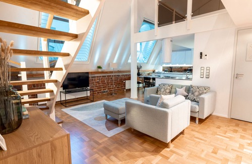 Helsinki City Centre Apartment | Modern 4-Star Penthouse with Kitchen & Child-Friendly Amenities