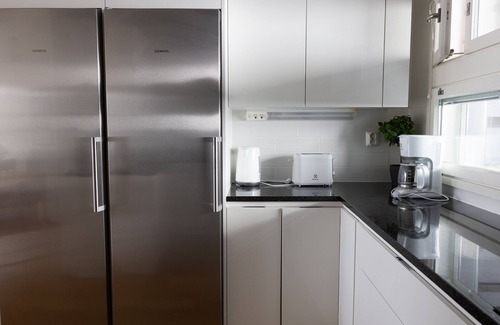 Kluuvi Apartment | Elegant 2-Story Home with Sauna and Family-Friendly Amenities