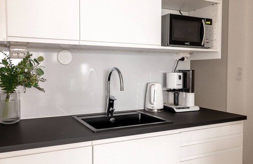 Kamppi Apartment | Modern 1BR Retreat with Sauna, Balcony & Family Amenities