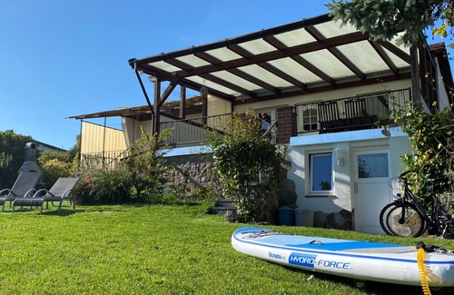 Leezen House | 2P vacation home at the bathing lake with fishing boat near Schwerin - Mecklenburgerin
