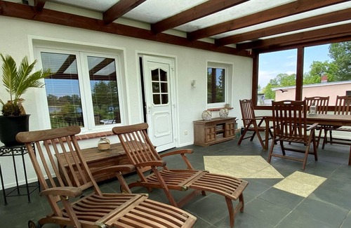 Leezen House | 2P vacation home at the bathing lake with fishing boat near Schwerin - Mecklenburgerin