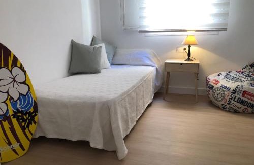 Plaza De La Costera Apartment | Relax by the Beach at Bellreguard - 4-Star Family Haven