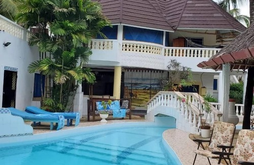 Galu Beach Villa | Relaxing 3-Bedroom Villa with Pool at Diani Beach