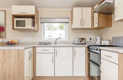Narberth House | Cozy Caravan with Pool Access and Family-Friendly Amenities