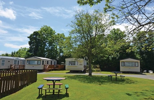Narberth House | Cozy Caravan with Pool Access and Family-Friendly Amenities