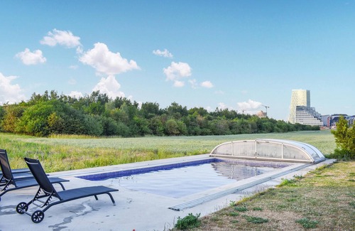 Vintrie House | Relax by the Pool at This Ideally Located Vacation Home