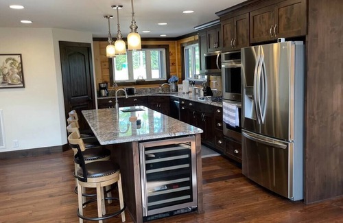 Granite Falls Cabin | Idyllic Lakefront Log Cabin with Private Dock & Pool