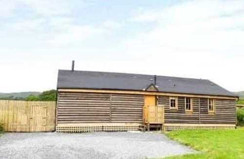 Llanbrynmair Cabin | Unforgettable Deer Log Cabin in Mid Wales with Hot Tub