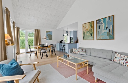 Hornsved House | Modern Wooden House with Family-Friendly Garden & Lake Views