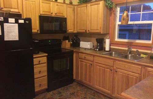 Colington House | Pet-Friendly 3 Bedroom Retreat with Pool & Spa Access