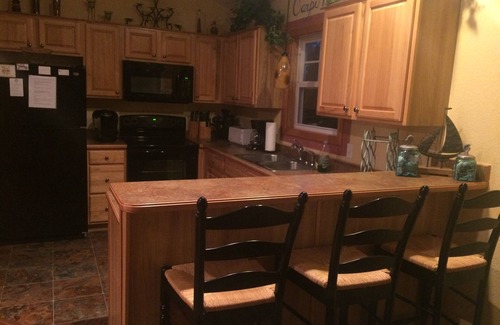 Colington House | Pet-Friendly 3 Bedroom Retreat with Pool & Spa Access