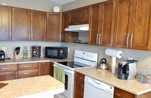 Grande Prairie House | Cozy 3-Bedroom Retreat with Private Patio Near Dining